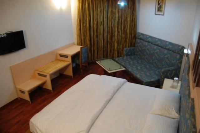 Pleasant Stay Kodai Hotel Pvt. Ltd. Kodaikanal Quarto foto